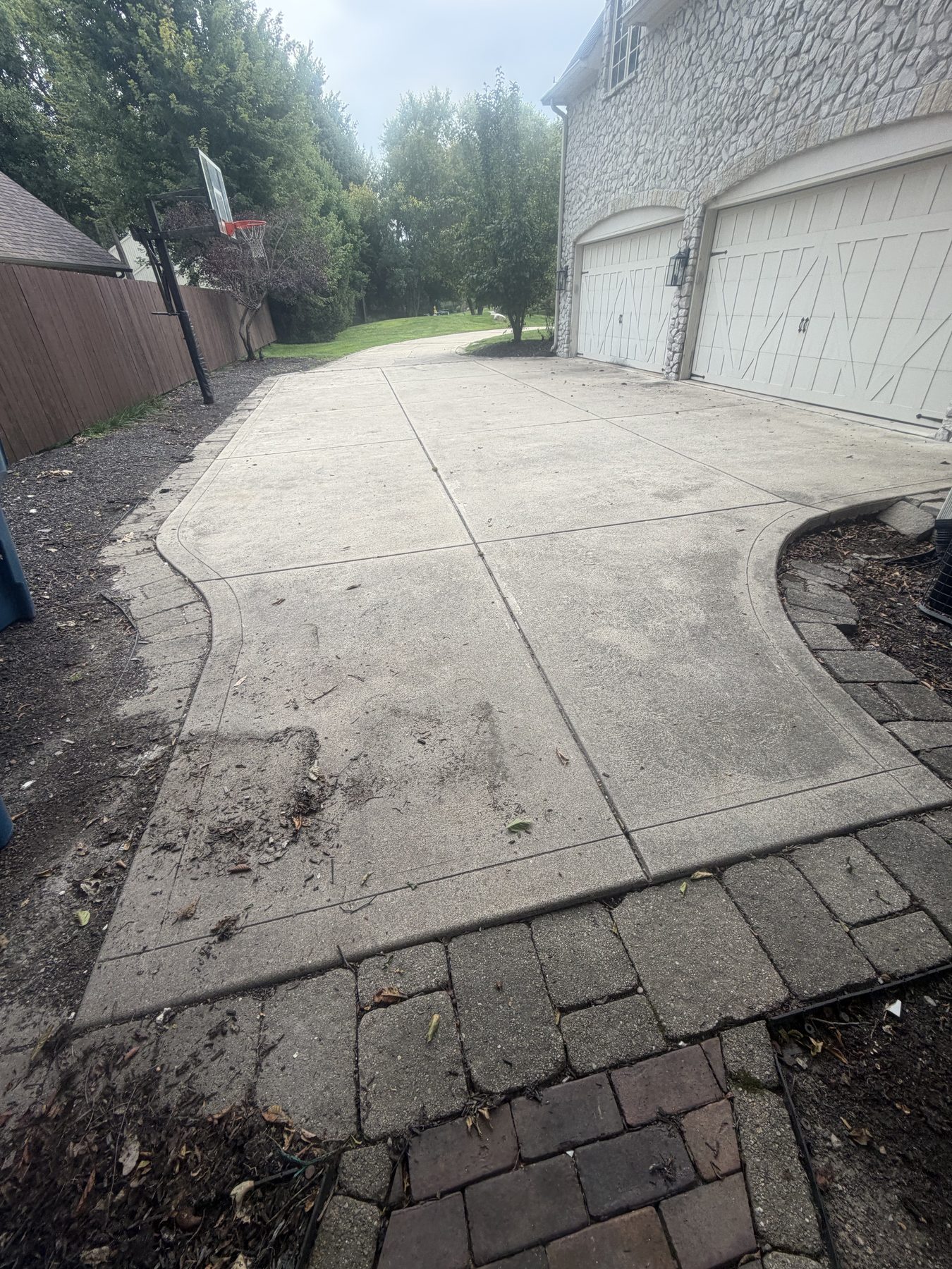 Before professional driveway pressure washing