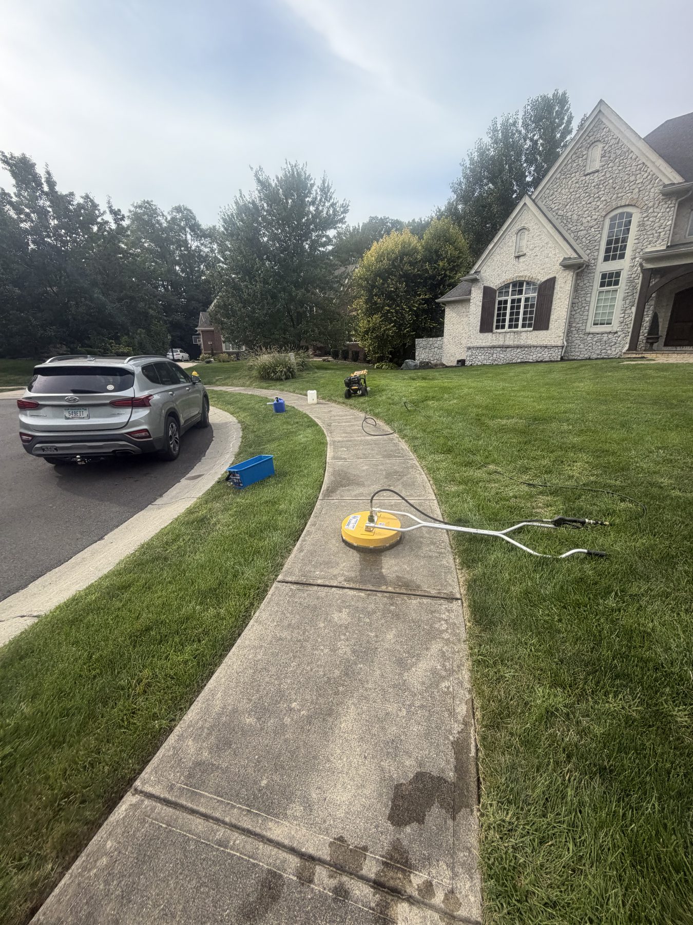 Before professional sidewalk and walkway pressure washing